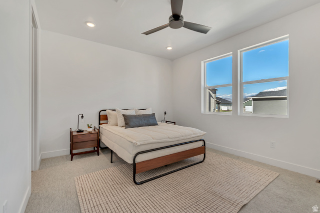 1302 1475 East, Unit 40 Payson, UT 84651 - Photo 20 of 34 Bedroom with recessed lighting, ceiling fan, and light carpet