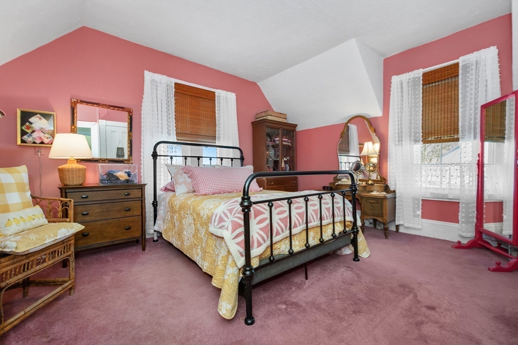 41 Walnut Street Hudson, MA 01749 - Photo 5 of 15 a bedroom with a bed and a tv
