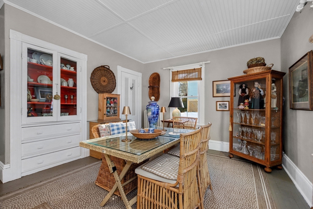 41 Walnut Street Hudson, MA 01749 - Photo 10 of 15 a view of a dining room with furniture and wooden floor