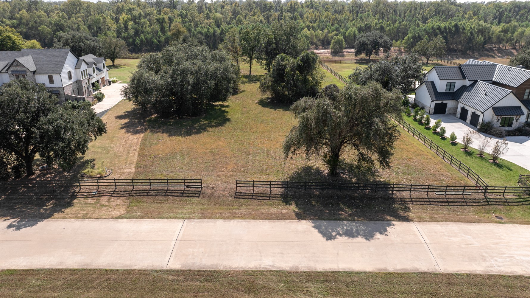 30958 Riverlake Road Fulshear, TX 77441 - Photo 2 of 9 an aerial view of a house with a yard