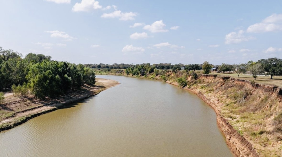 30958 Riverlake Road Fulshear, TX 77441 - Photo 4 of 9 a view of a lake