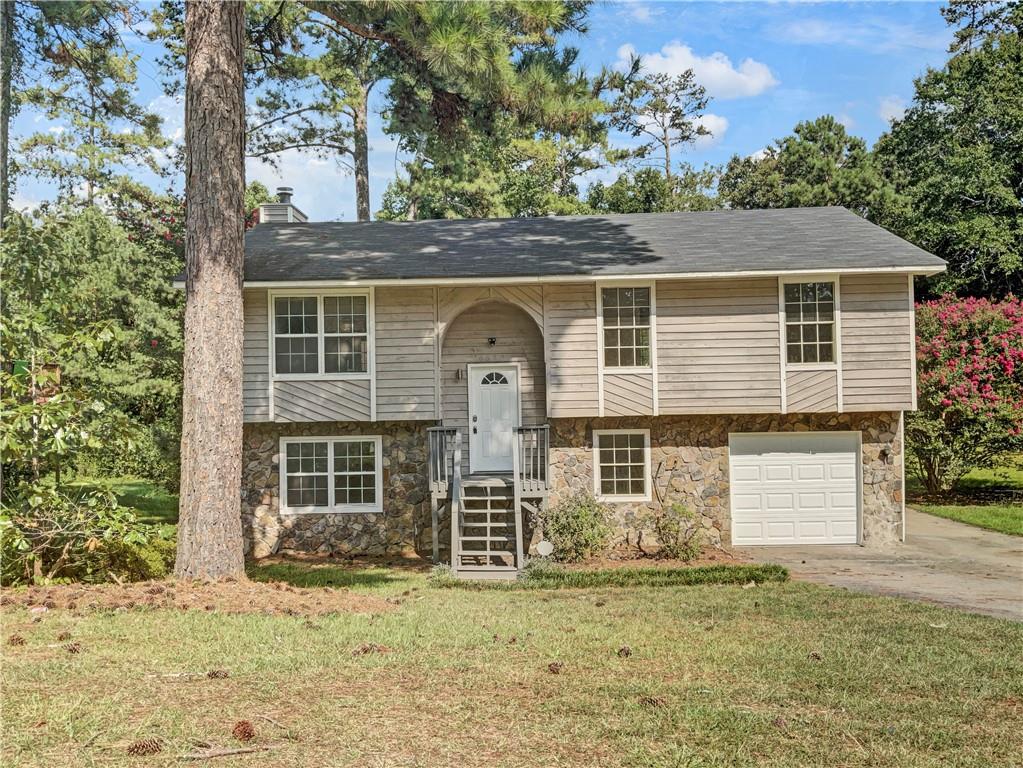 6620 Connell Road Fairburn, GA 30213 - Photo 1 of 1 front view of a house with a yard