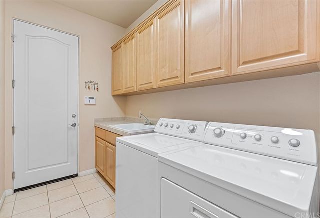 a view of a patio with a backyard