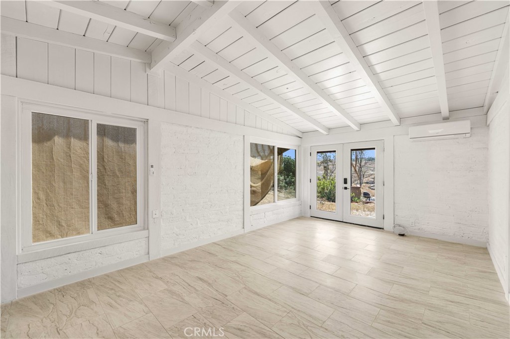 6308 Hawarden Drive Riverside, CA 92506 - Photo 25 of 37 a view of an empty room with a window