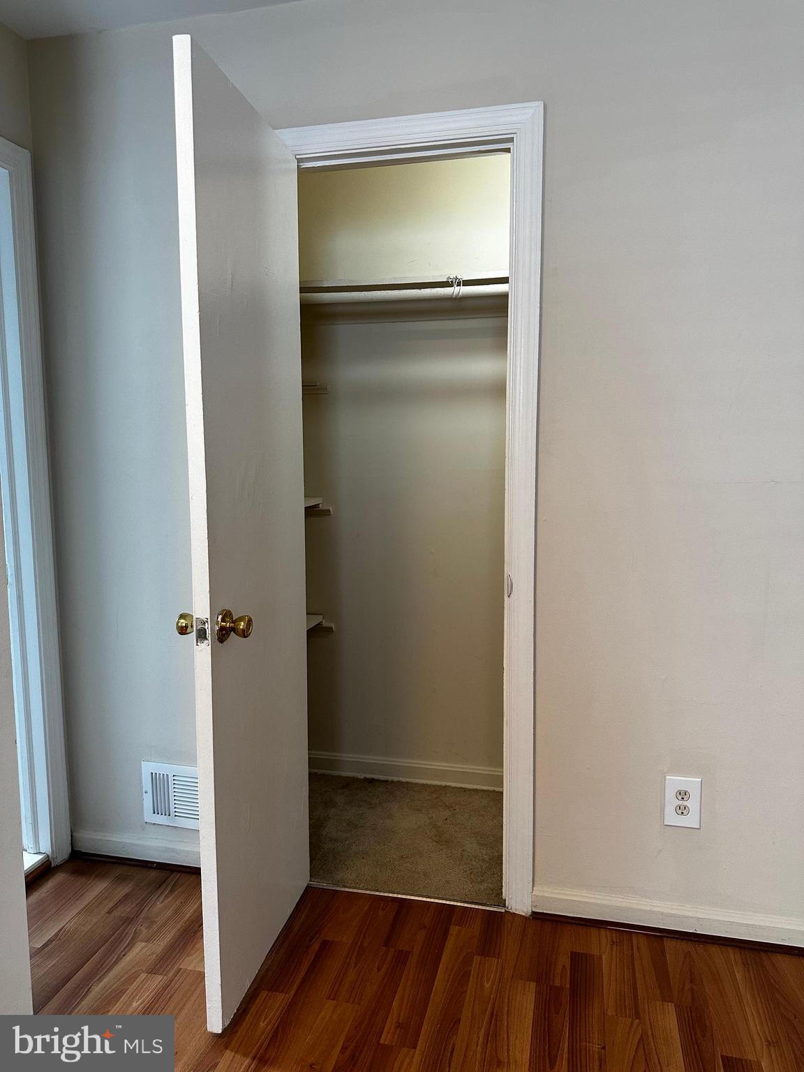 214 10th Street Laurel, MD 20707 - Photo 103 of 118 a view of empty room with wooden floor