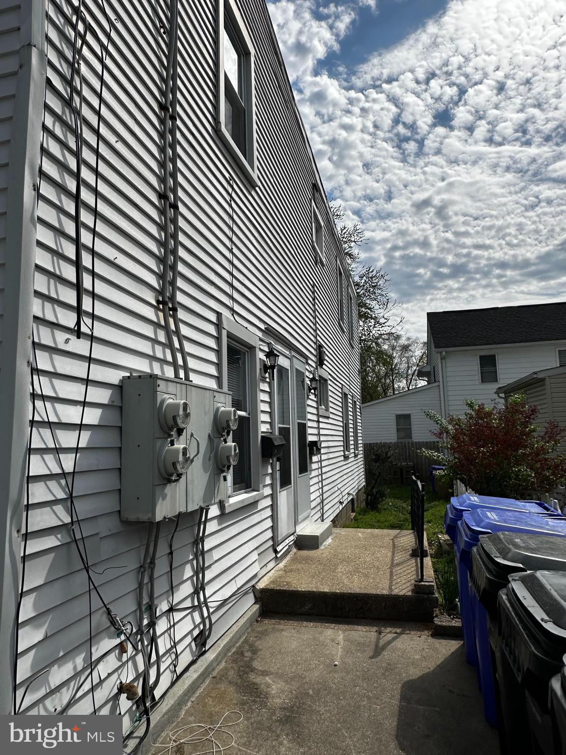 214 10th Street Laurel, MD 20707 - Photo 11 of 118 a view of house with backyard outdoor seating and barbeque oven