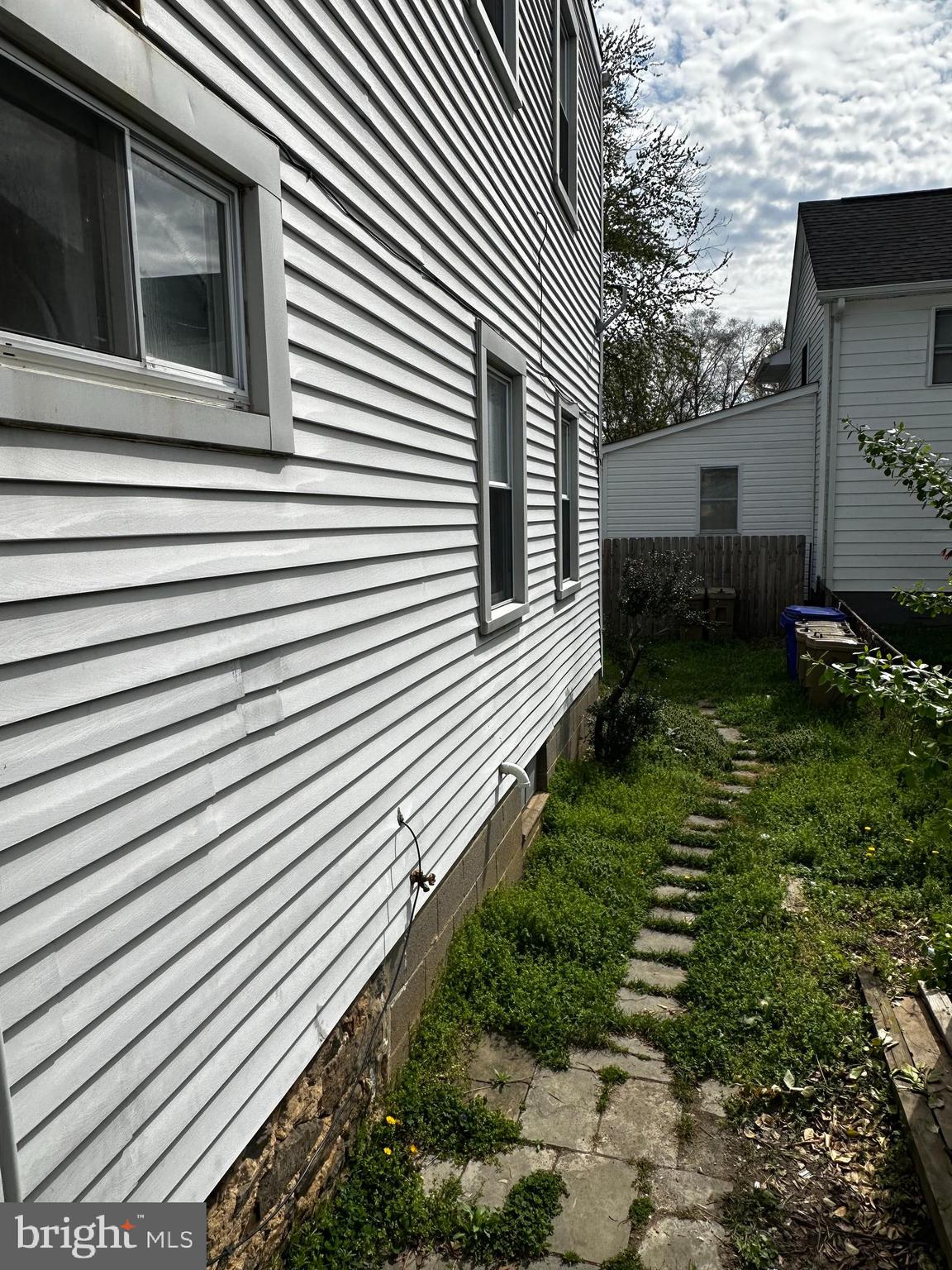 214 10th Street Laurel, MD 20707 - Photo 13 of 118 a backyard of a house with lots of green space