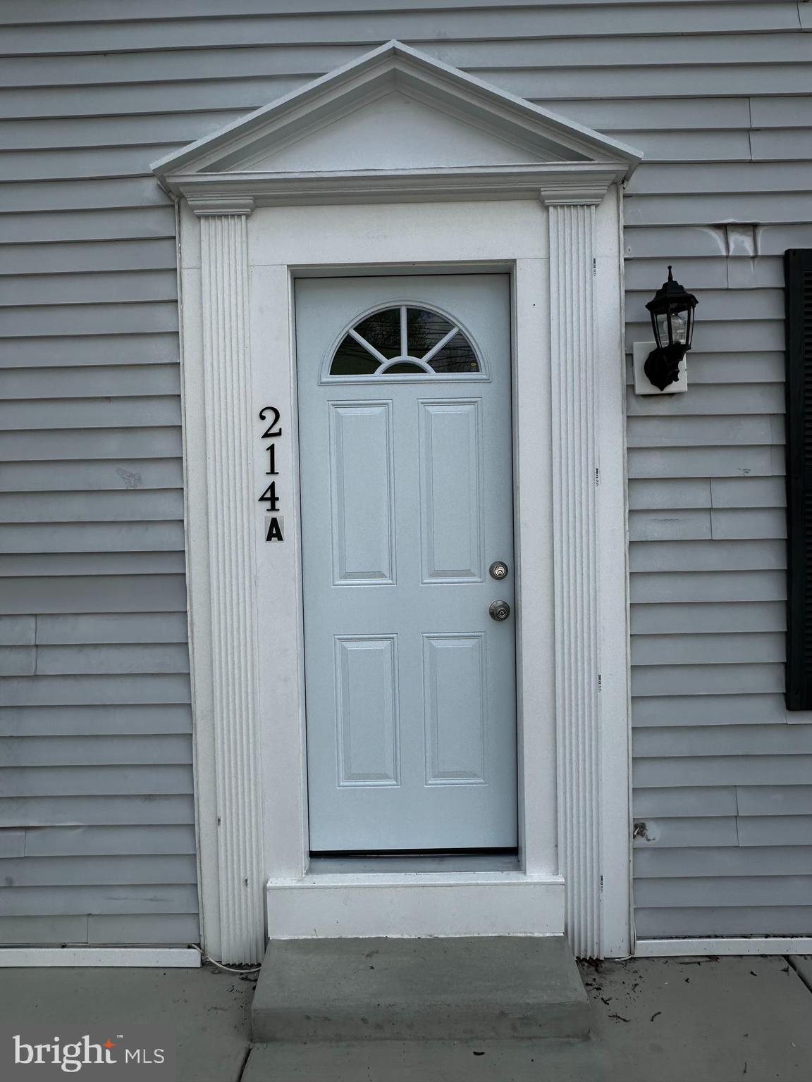 214 10th Street Laurel, MD 20707 - Photo 23 of 118 a view of front door and a car garage