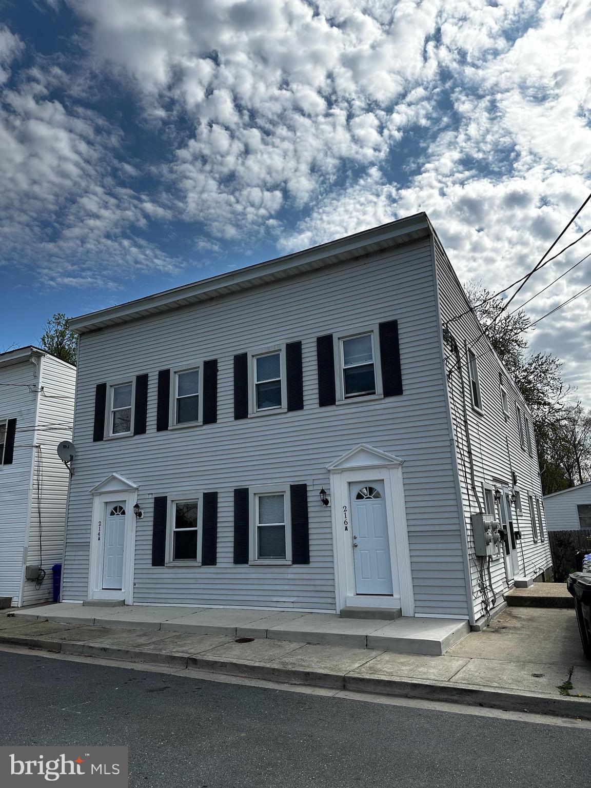 214 10th Street Laurel, MD 20707 - Photo 3 of 118 a house that has a tree in front of it