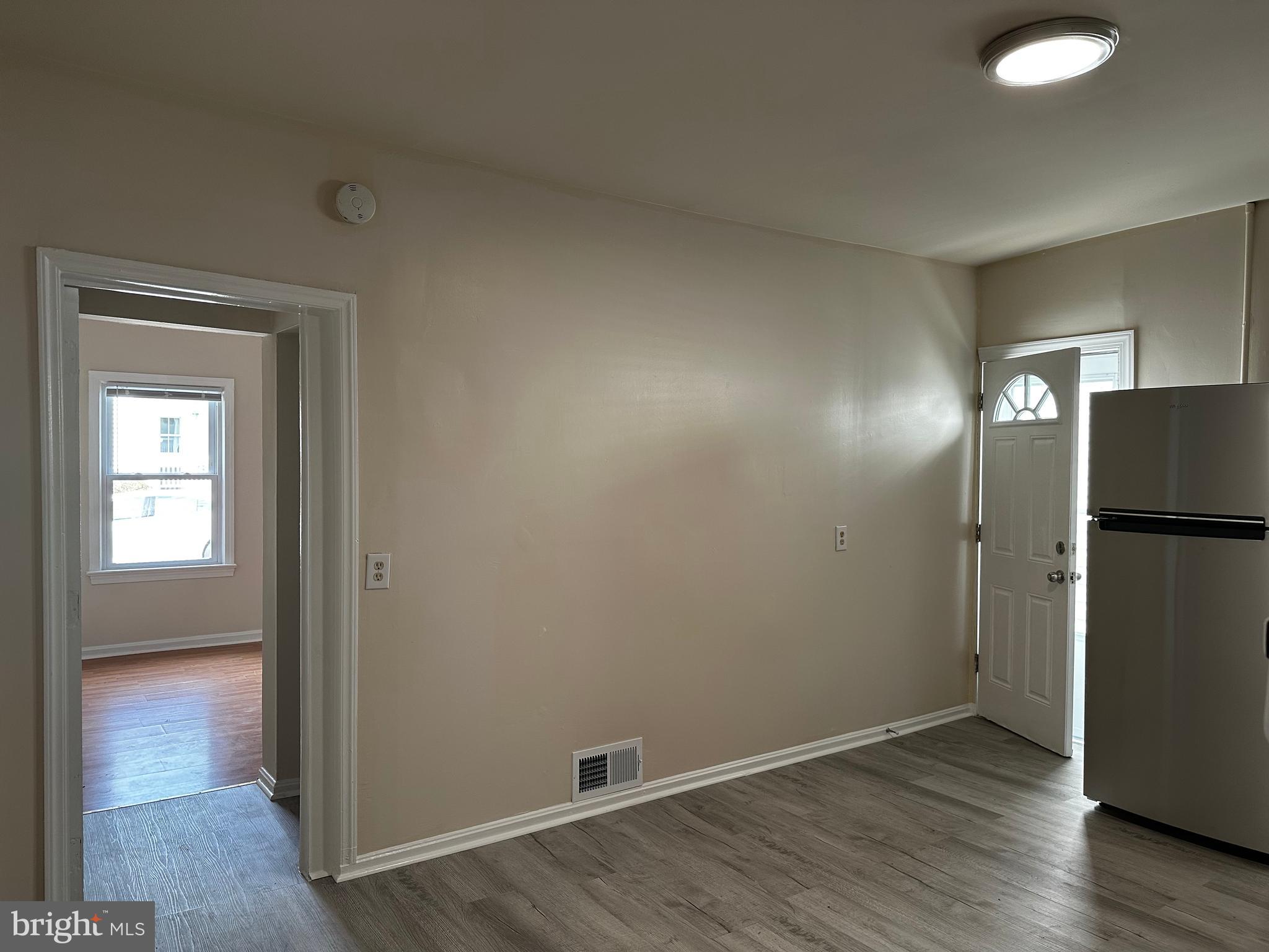 214 10th Street Laurel, MD 20707 - Photo 36 of 118 a view of an empty room with closet and a window