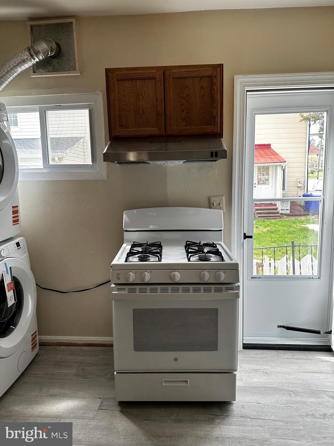 214 10th Street Laurel, MD 20707 - Photo 61 of 118 a stove top oven sitting inside of a kitchen