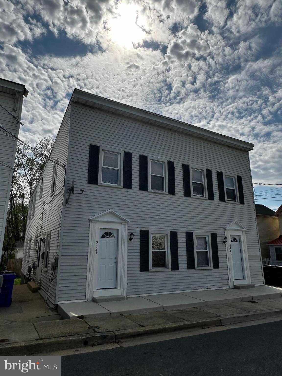 214 10th Street Laurel, MD 20707 - Photo 8 of 118 a front view of a house with a yard