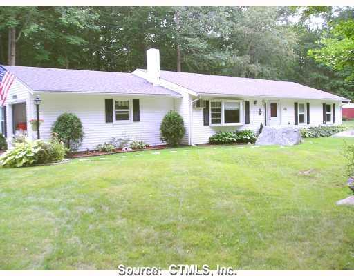 105 Airline Road Clinton, CT 06413 - Photo 1 of 1 a front view of a house with garden