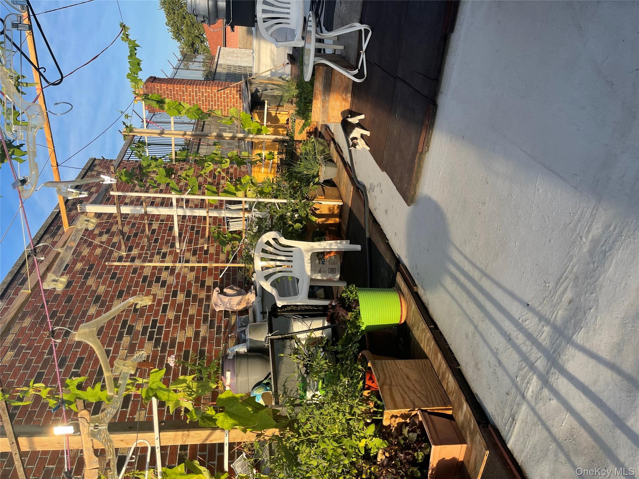 a view of a balcony with cars