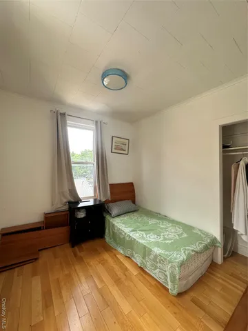 a bathroom with a sink toilet and mirror