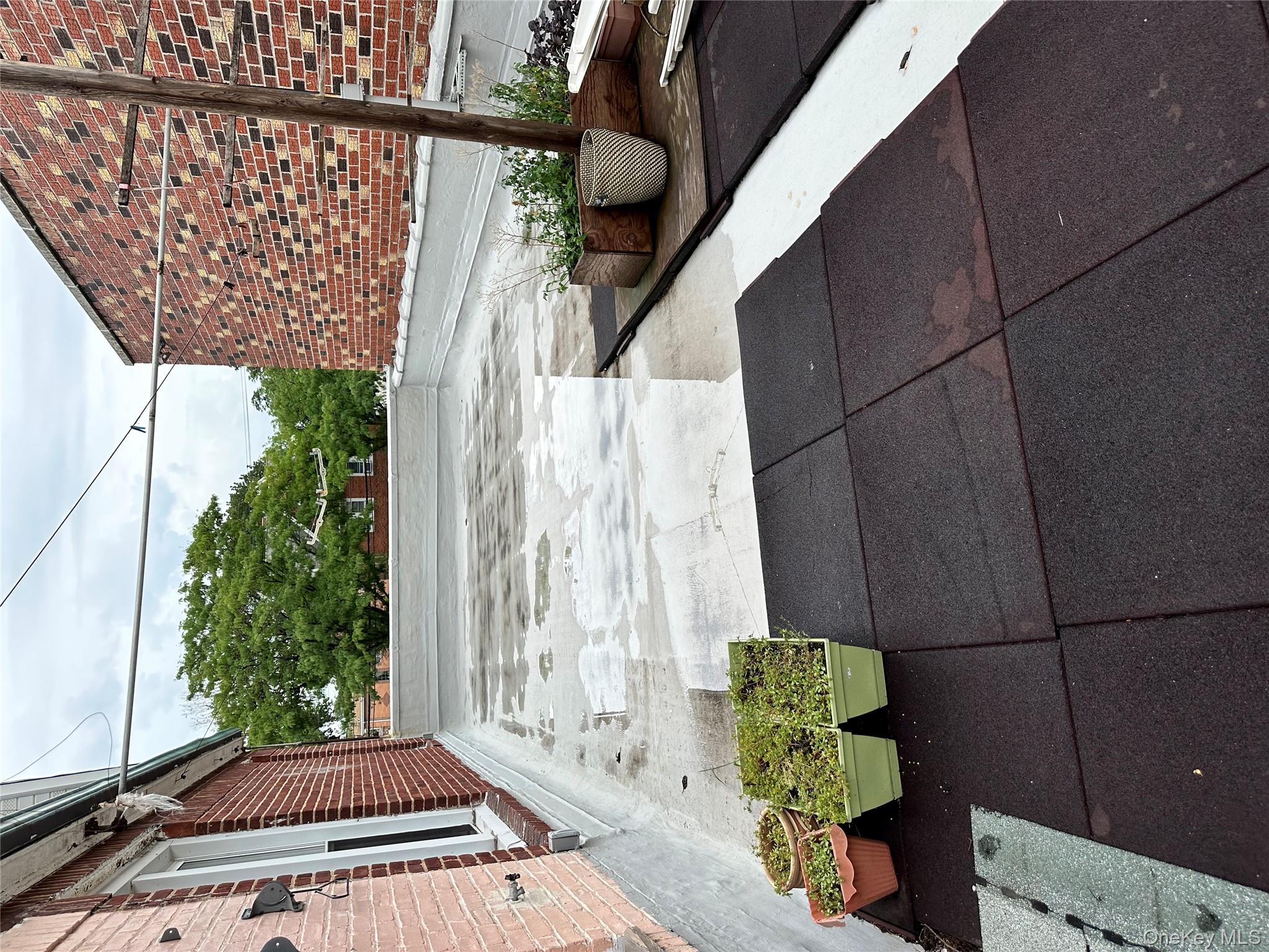 77-02 164th Street, Unit 2 Queens, NY 11366 - Photo 8 of 17 a view of a entryway door of the house