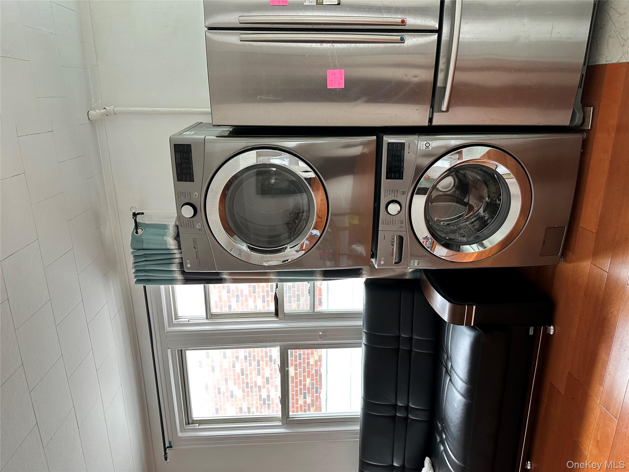77-02 164th Street, Unit 2 Queens, NY 11366 - Photo 9 of 17 a living room with furniture and a window