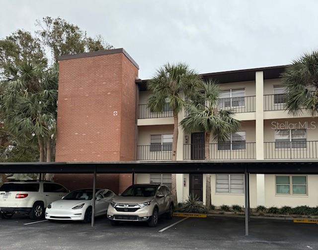 2452 Enterprise Road, Unit 2 Clearwater, FL 33763 - Photo 1 of 1 a car parked in front of a building