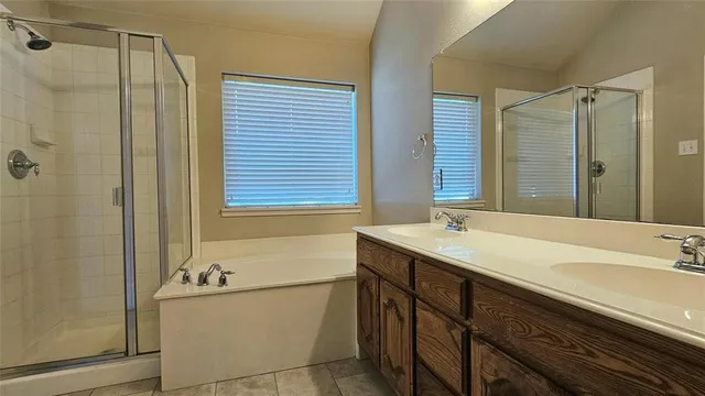 a bathroom with a sink and a bathtub