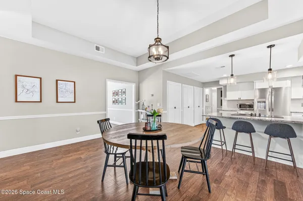 a view of yard with swimming pool and green space