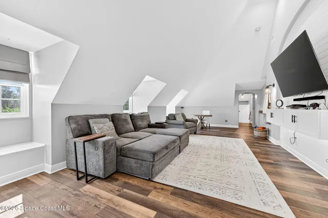 an aerial view of residential house with outdoor space and swimming pool