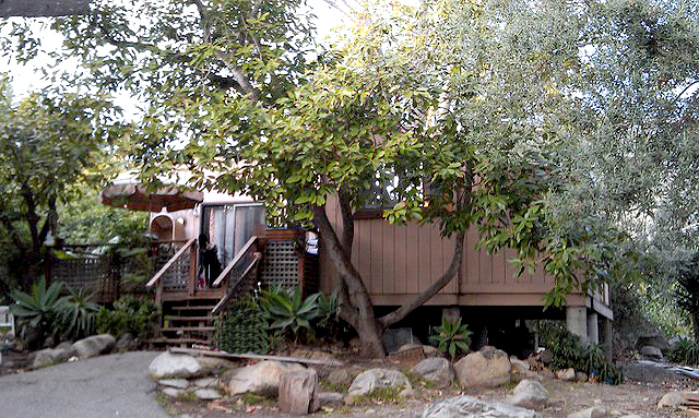 a backyard of a house with lots of green space