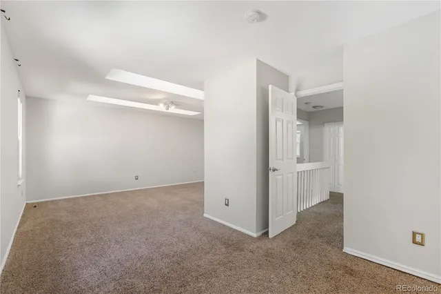 an empty room with an entryway