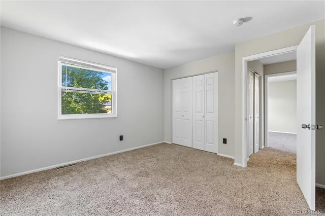 a view of a backyard of a house