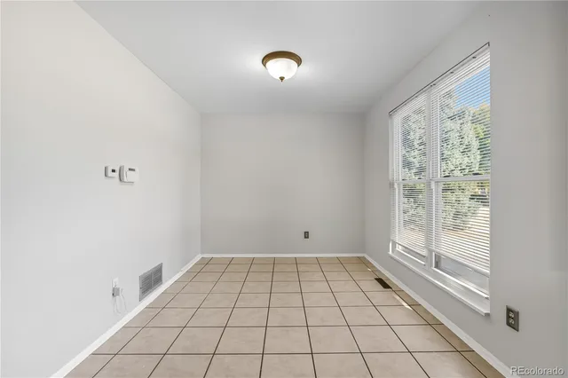 a view of a bedroom and window