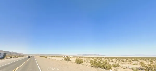 a view of beach and an ocean