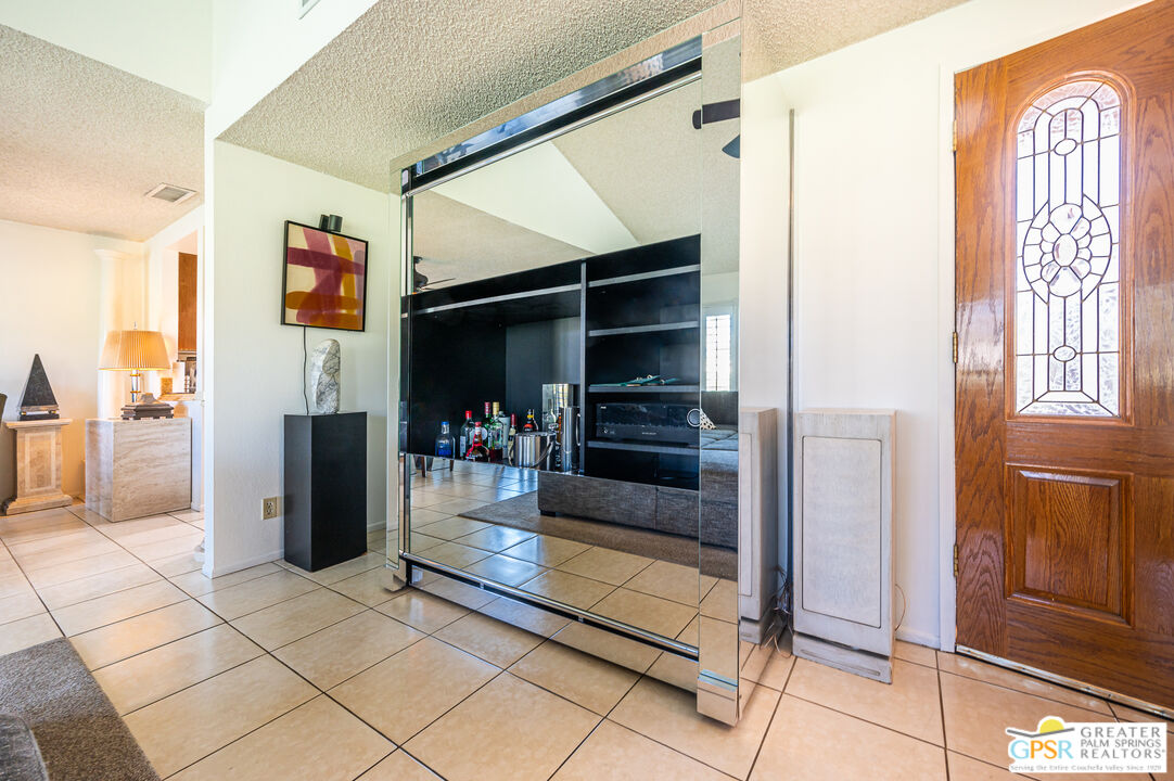 6000 East Driver Road Palm Springs, CA 92264 - Photo 21 of 40 a view of front door view and living room