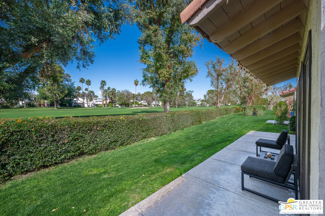 6000 East Driver Road Palm Springs, CA 92264 - Photo 4 of 40 a view of a patio with a yard