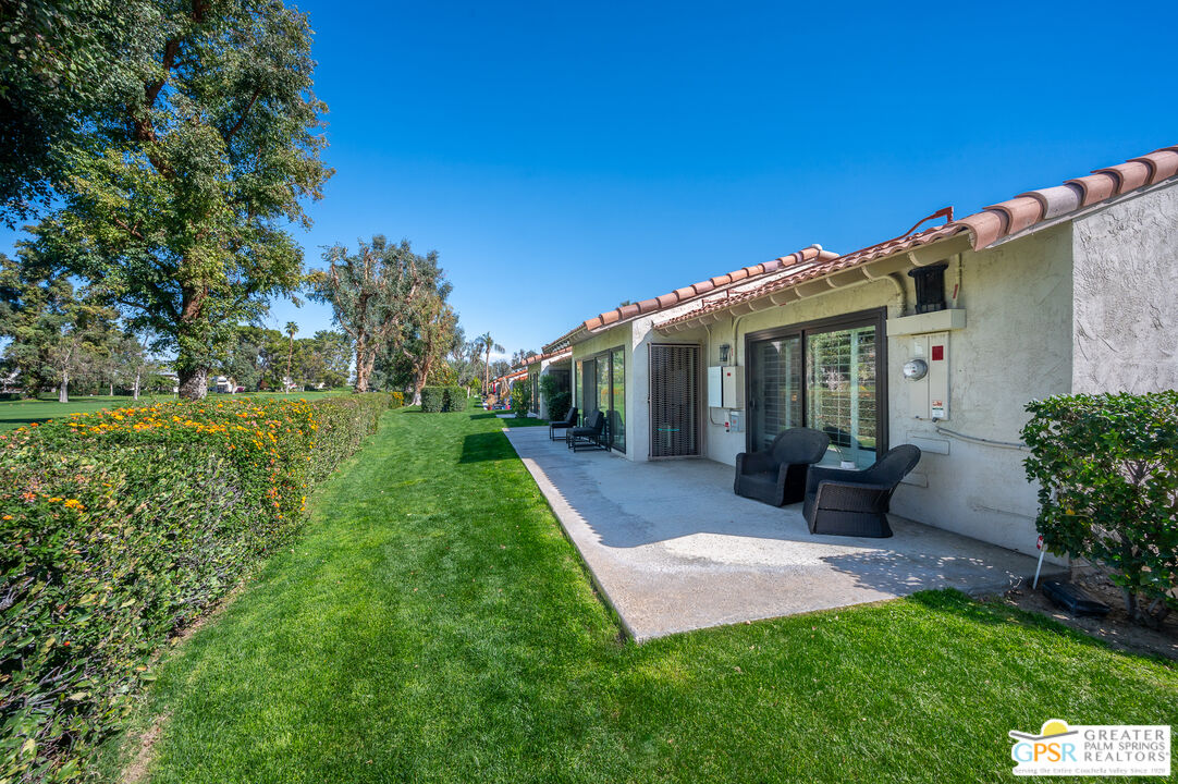 6000 East Driver Road Palm Springs, CA 92264 - Photo 6 of 40 a view of a house with a garden