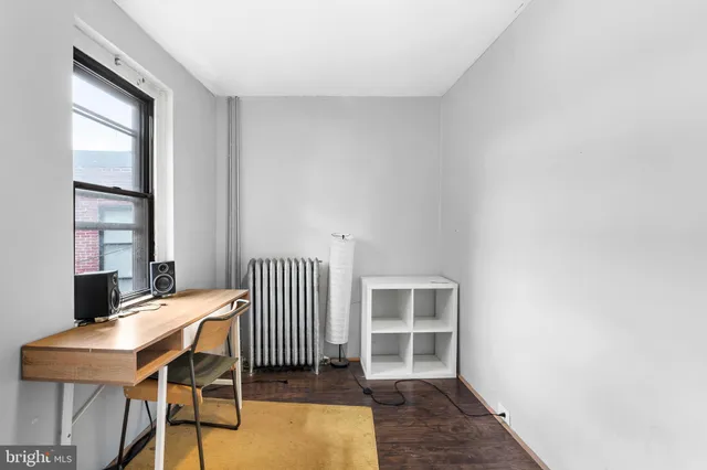 a view of a livingroom with furniture and window