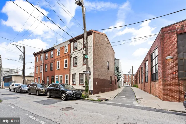 a car parked in front of a building