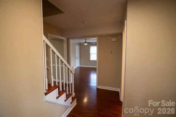 a view of entryway with wooden floor
