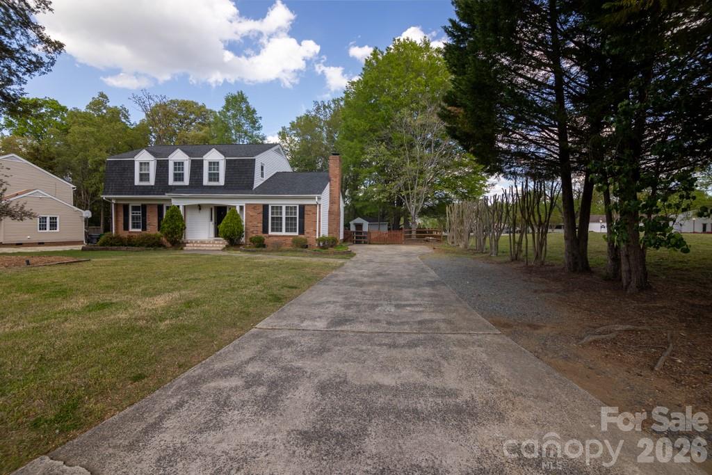 2232 Lawton Bluff Road Charlotte, NC 28226 - Photo 2 of 42 a front view of a house with a yard