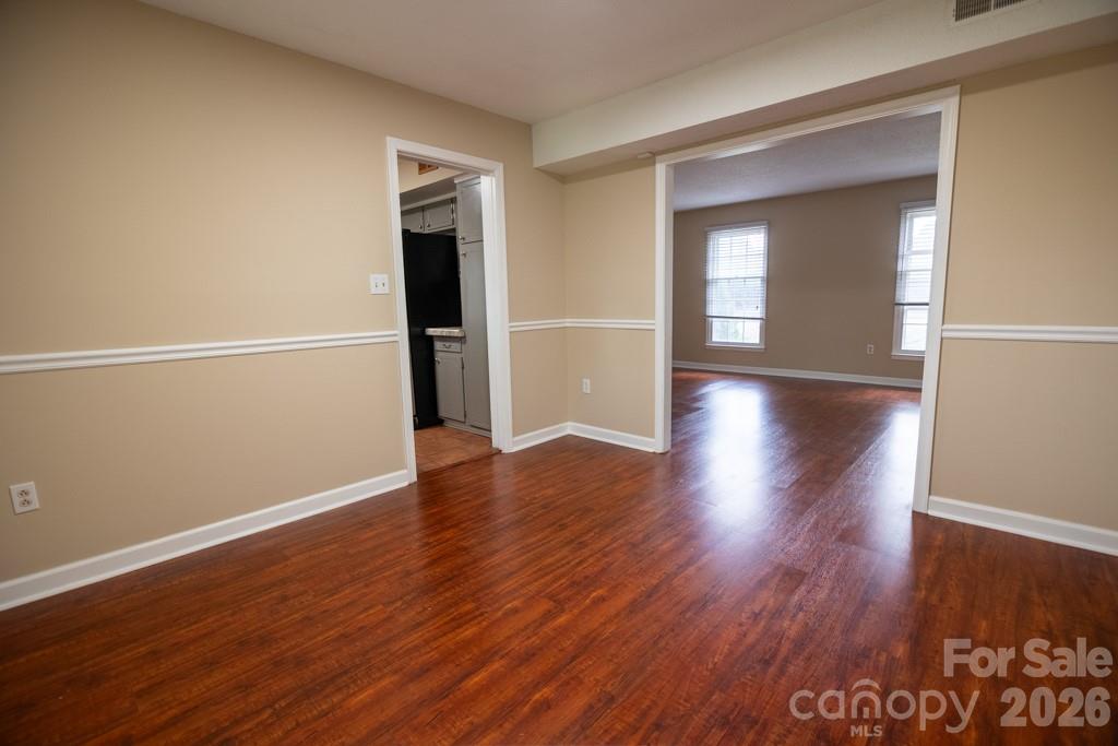 2232 Lawton Bluff Road Charlotte, NC 28226 - Photo 22 of 42 a view of a room with wooden floor and window