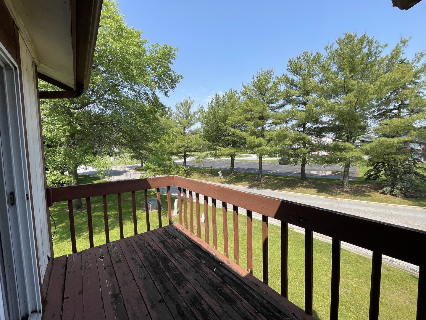 786 Delmar Court, Unit 6 University Park, IL 60484 - Photo 7 of 11 a view of a wooden deck with a yard
