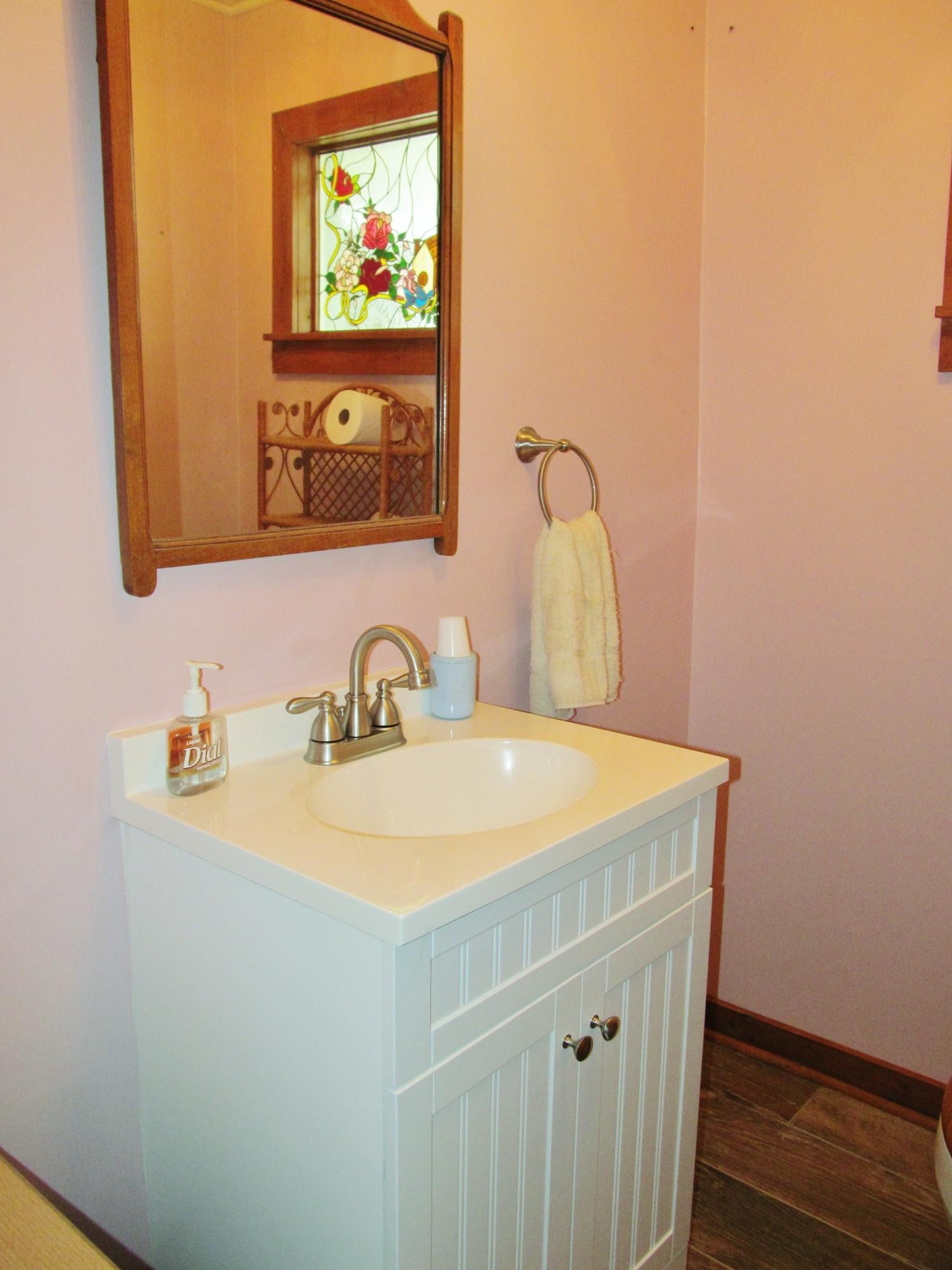345 Landrum Hill Road Lancing, TN 37770 - Photo 13 of 37 a bathroom with a sink and a mirror