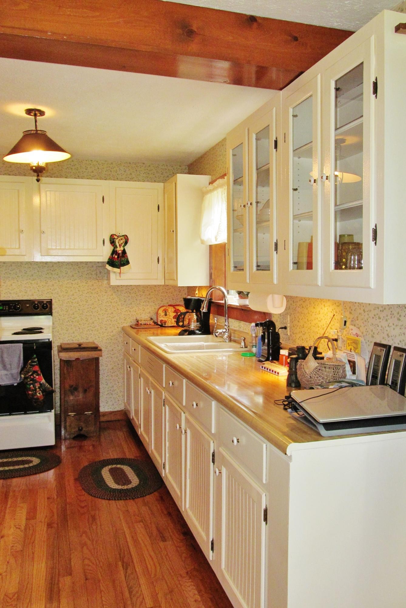 345 Landrum Hill Road Lancing, TN 37770 - Photo 5 of 37 a kitchen with stainless steel appliances granite countertop a sink and cabinets