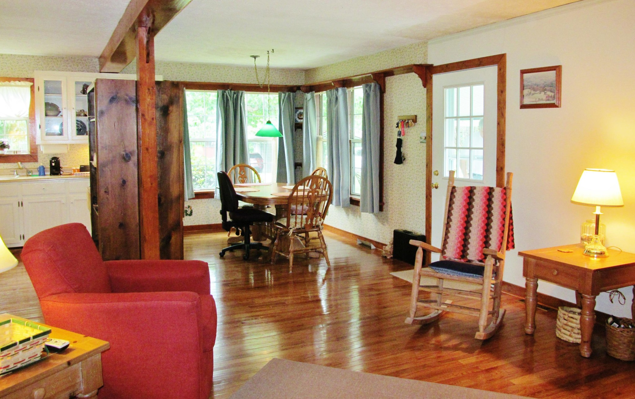 345 Landrum Hill Road Lancing, TN 37770 - Photo 9 of 37 a living room filled with furniture and a floor to ceiling window