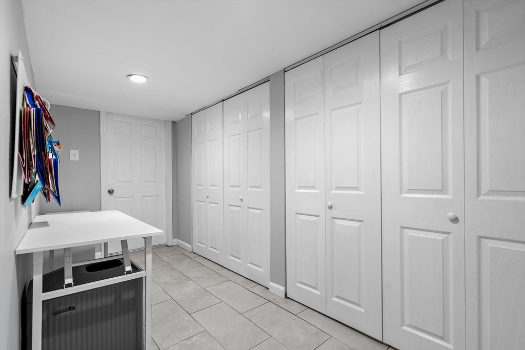 13 Mohegan Road Acton, MA 01720 - Photo 31 of 39 a room that has a bed and a closet in it
