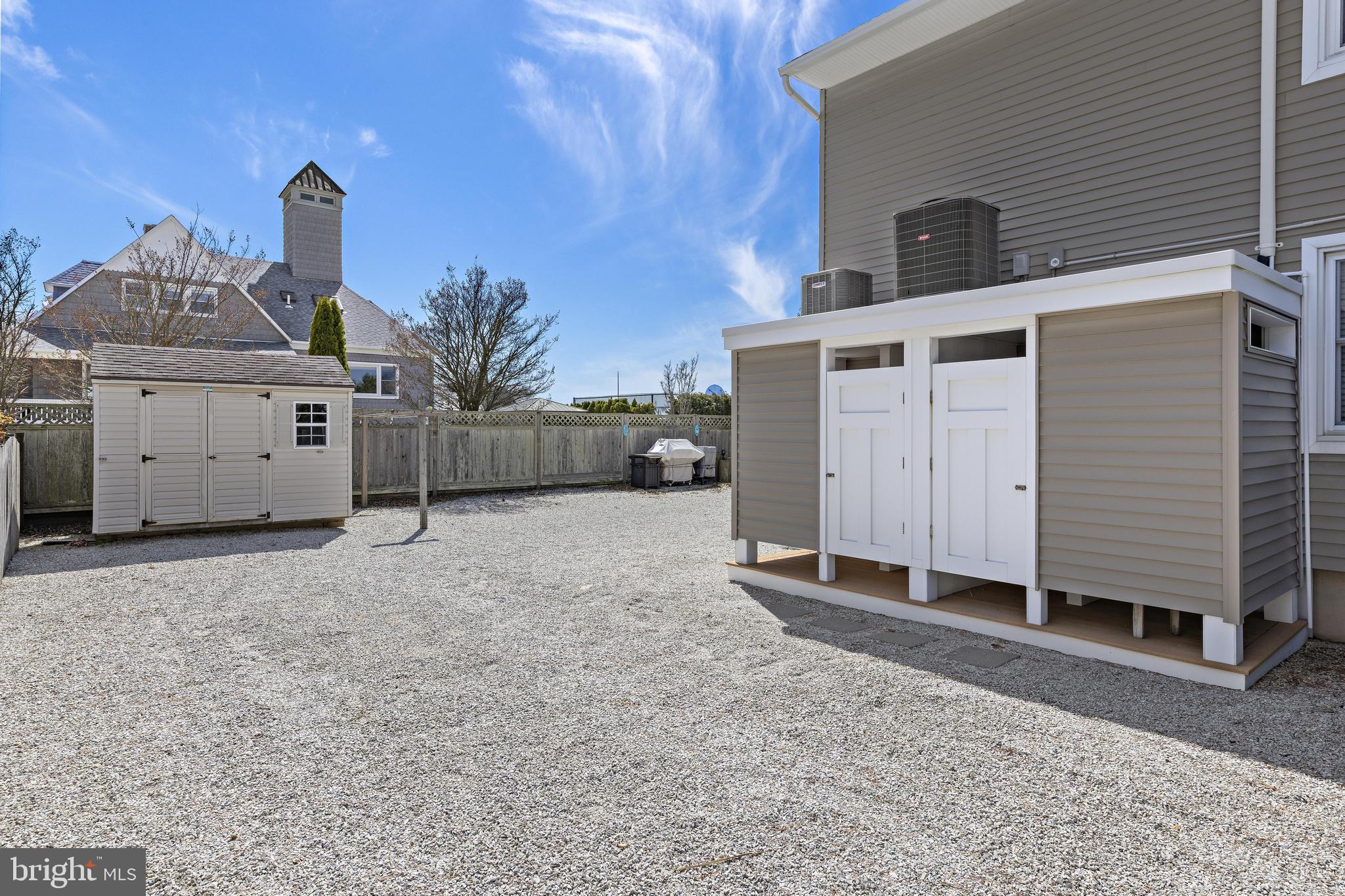 24 Joan Road Long Beach Township, NJ 08008 - Photo 32 of 55 a view of a house with a yard