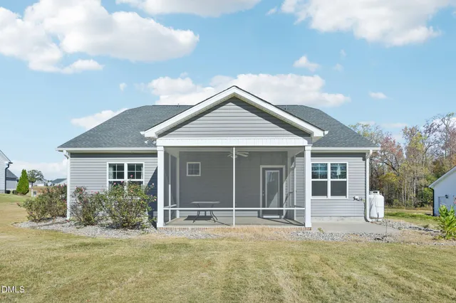 a swimming pool view with a lake view