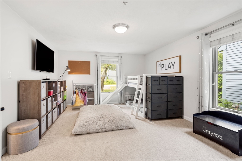 28 Andrews Farm Road Boxford, MA 01921 - Photo 16 of 42 a bedroom with a bed a flat screen tv and dresser