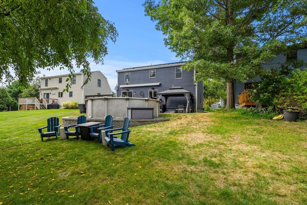 28 Andrews Farm Road Boxford, MA 01921 - Photo 42 of 42 a view of a house with backyard and sitting area