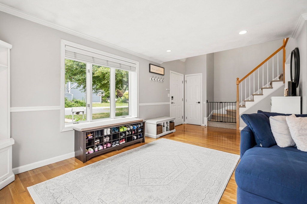 28 Andrews Farm Road Boxford, MA 01921 - Photo 7 of 42 a living room with furniture and a large window