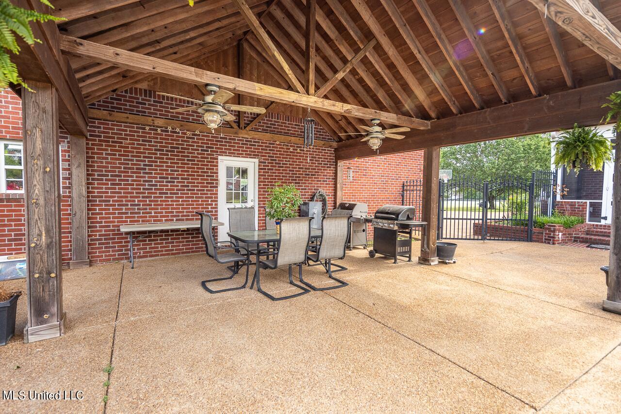 44 Myra Road Byhalia, MS 38611 - Photo 8 of 28 covered patio adjacent to pool