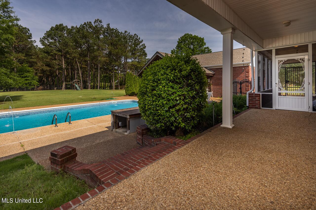 44 Myra Road Byhalia, MS 38611 - Photo 9 of 28 pool from covered back porch